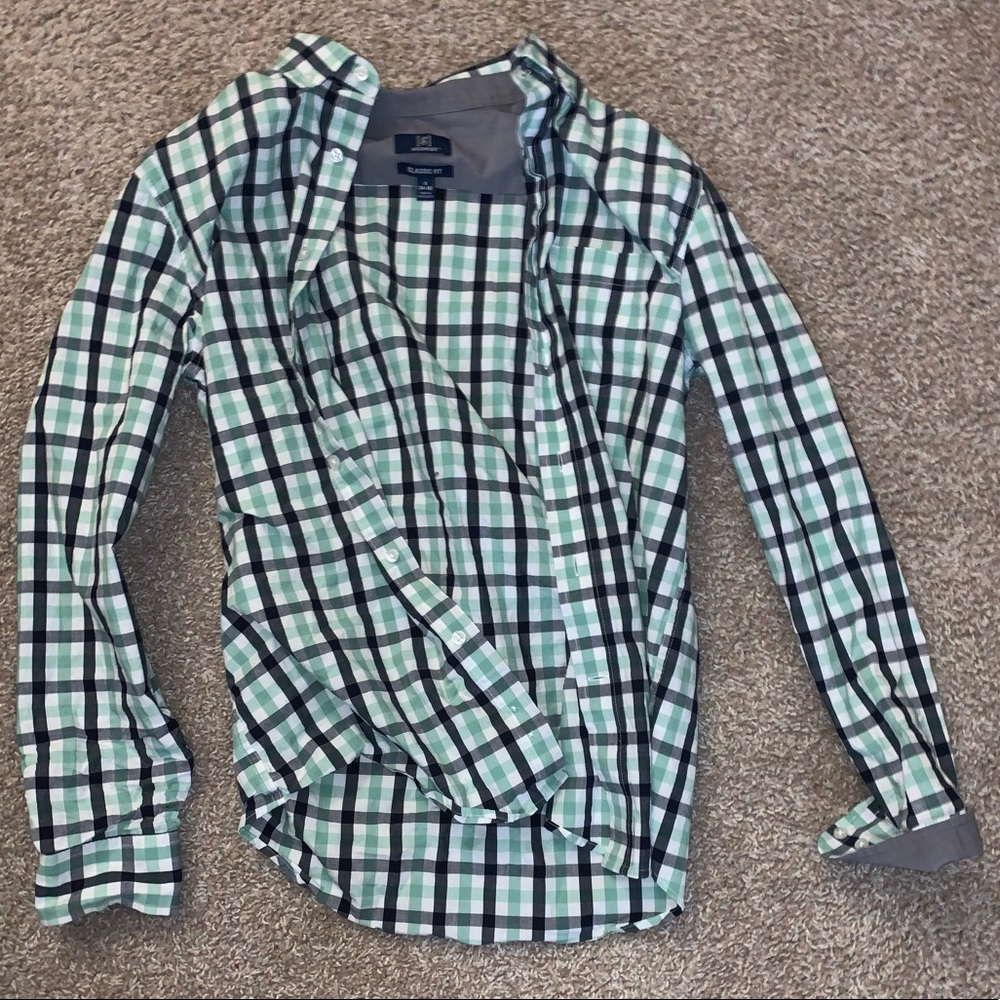 No holes or tears-all buttons intact- smoke free house